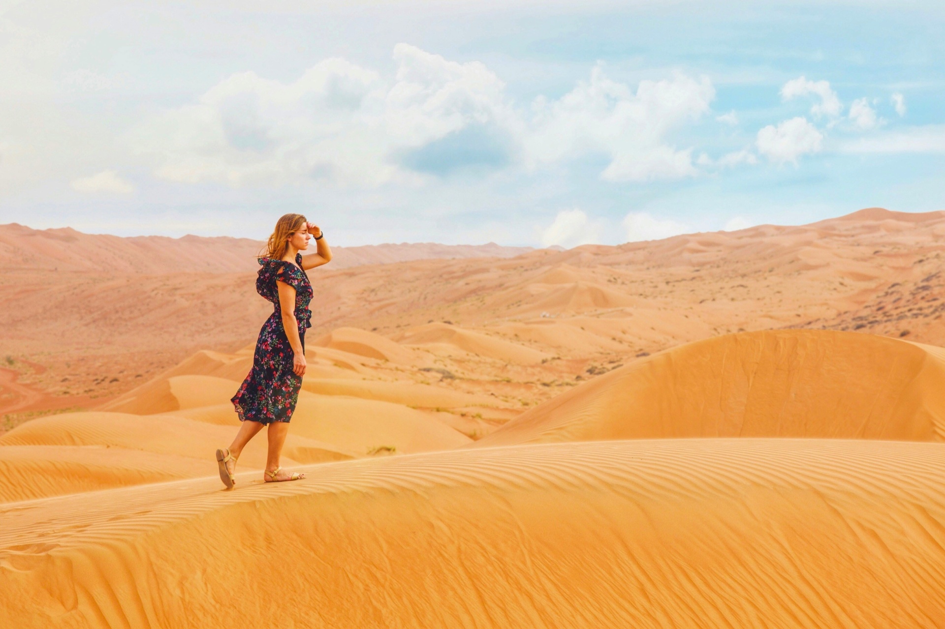 Traveler on Omani dunes