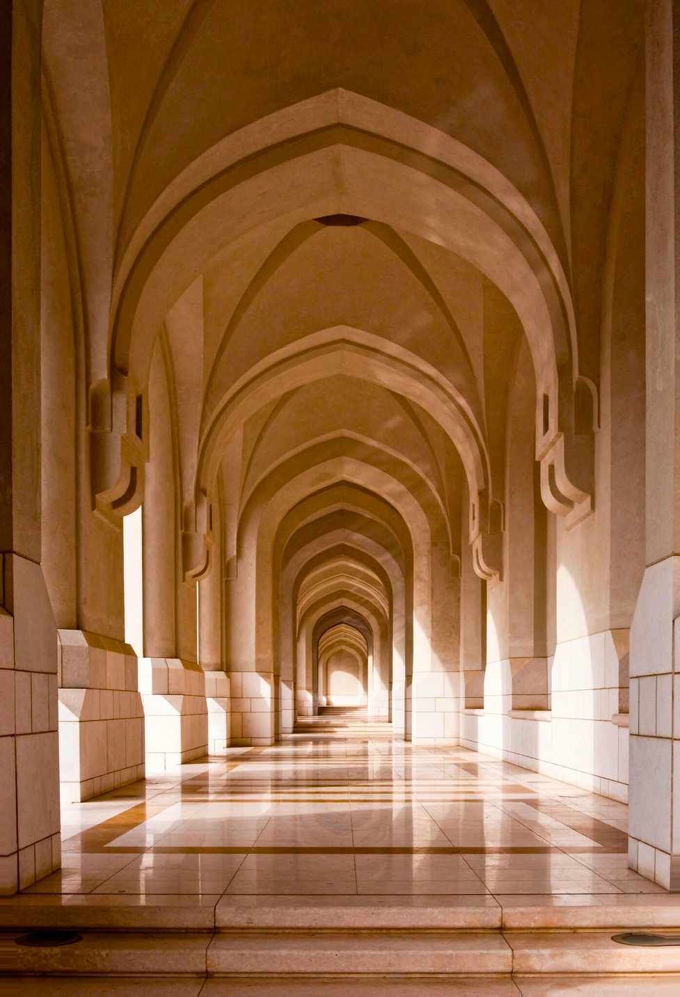 Ornate arched corridor at the Royal Opera House Muscat